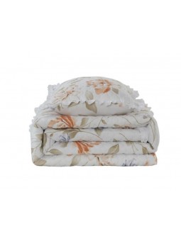 Colcha lencera con volante en tonos beige y nude.
