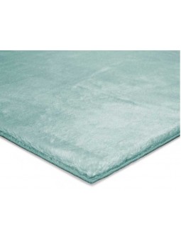 Detalle de tejido de alfombra en color liso de tejido extra suave en color verde agua