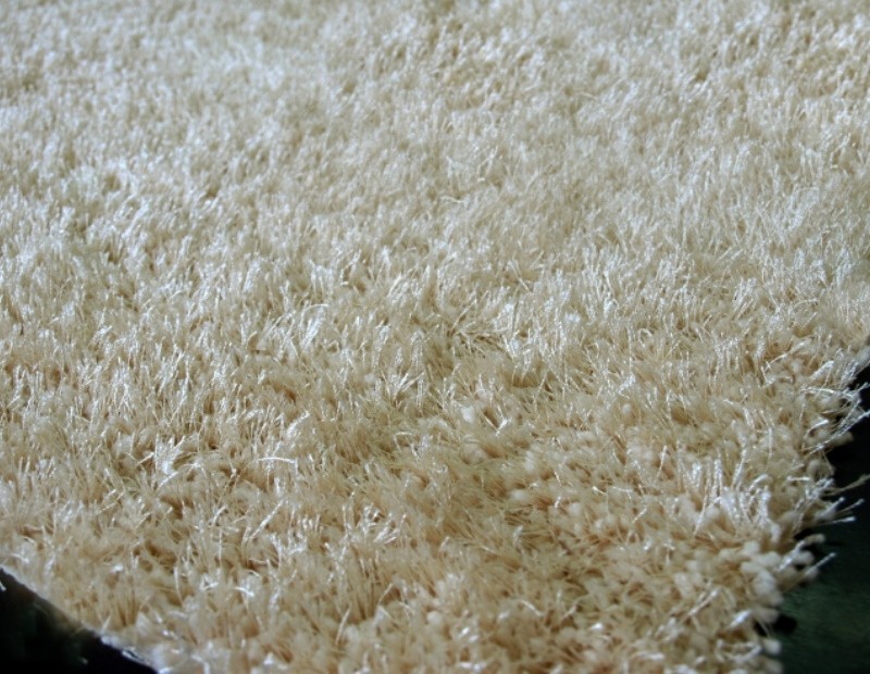 Alfombra de pelo en color liso marfil lavable