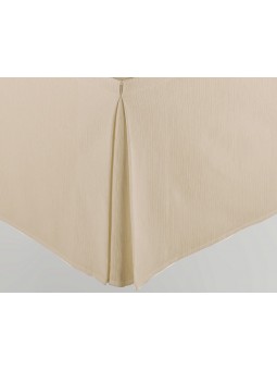 Cubre canapé de calidad en color beige crema para proteger tu canapé y vestir tu cama de forma elegante.