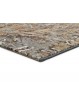 Alfombra vintage en tonos mostaza y gris.